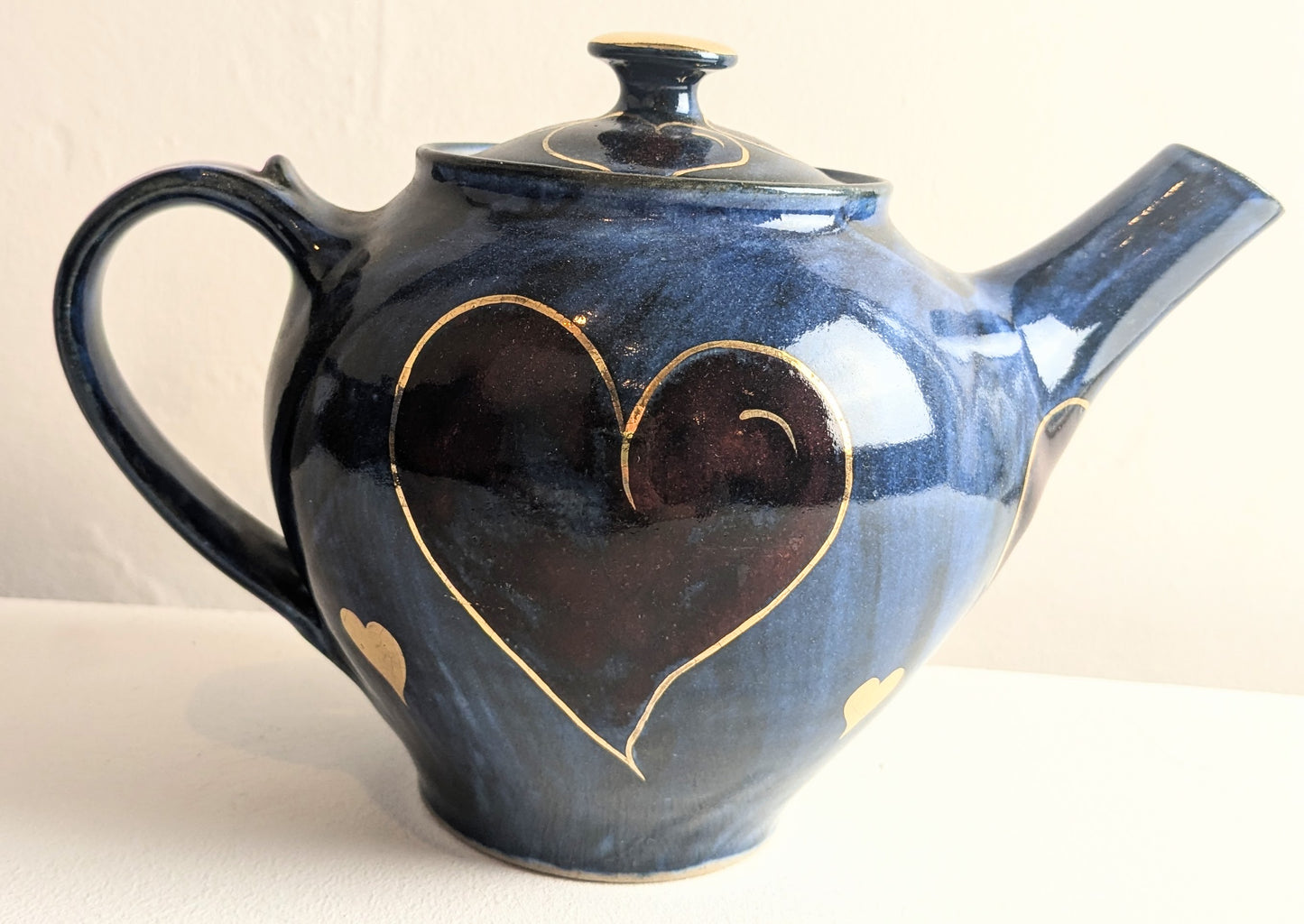 Goldsmith, Robert- Dark blue teapot with red heart