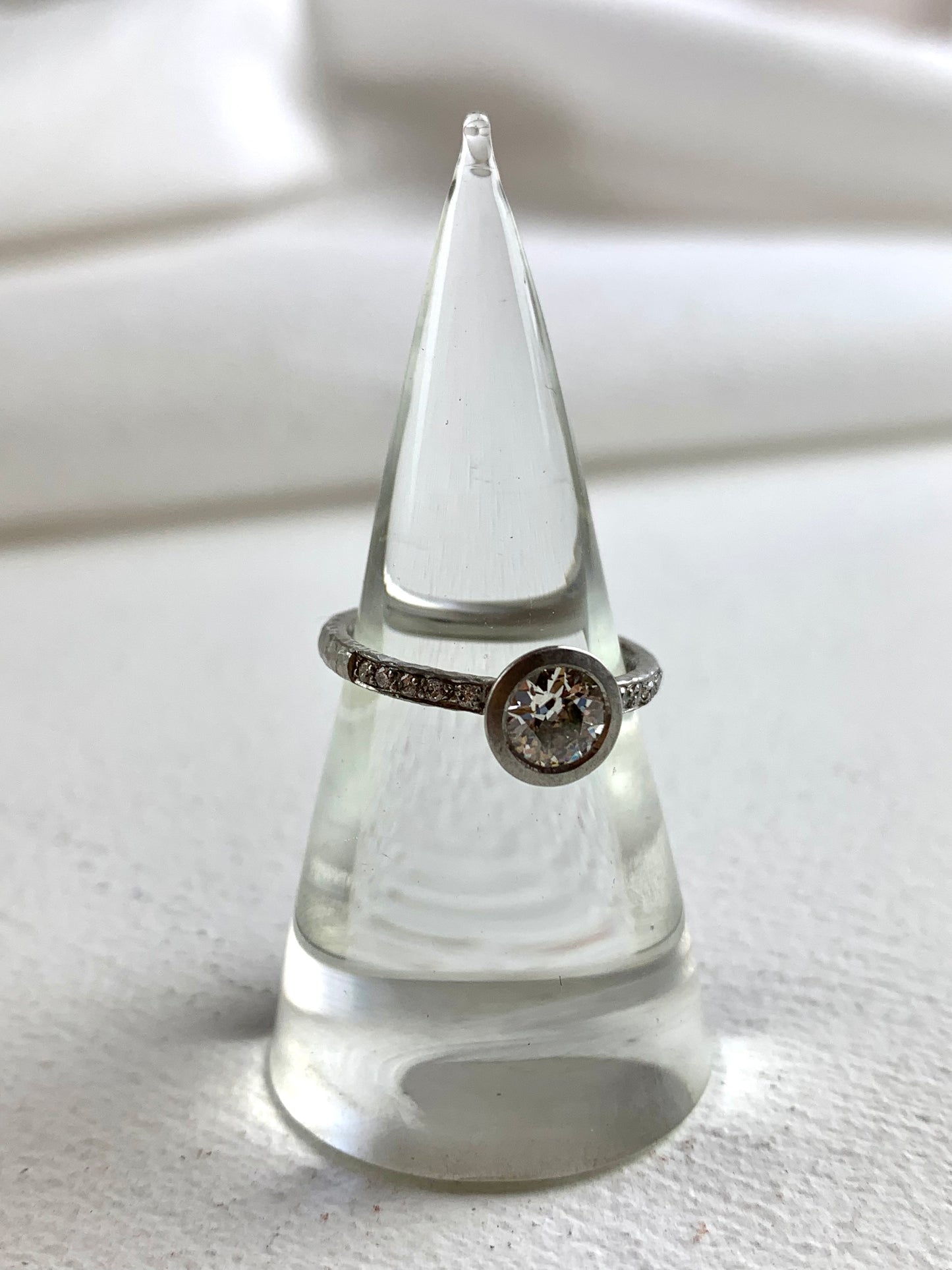 Betts, Malcolm - Platinum Ring with Channel Set Diamonds & Round Diamond, Size K