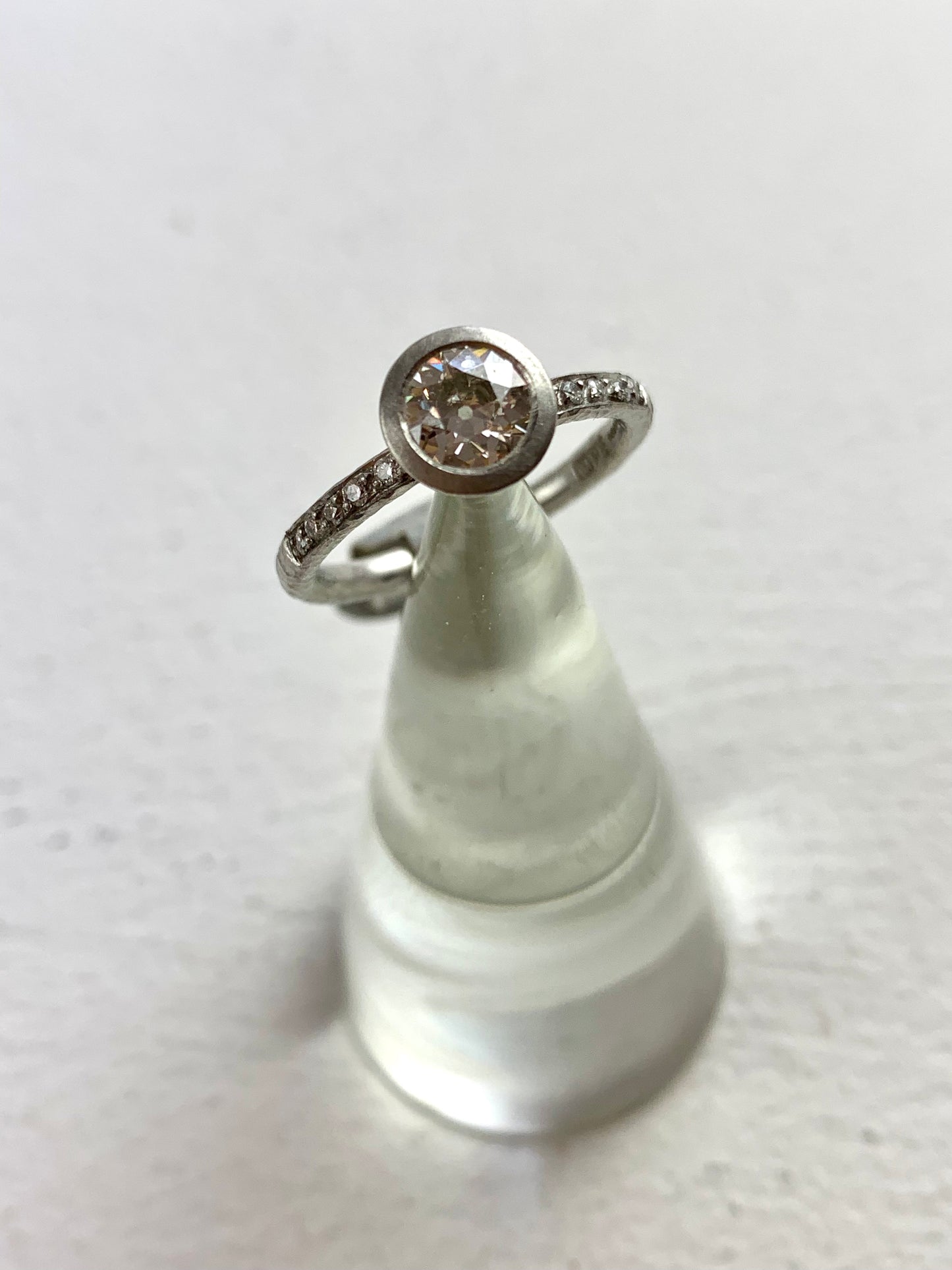 Betts, Malcolm - Platinum Ring with Channel Set Diamonds & Round Diamond, Size K