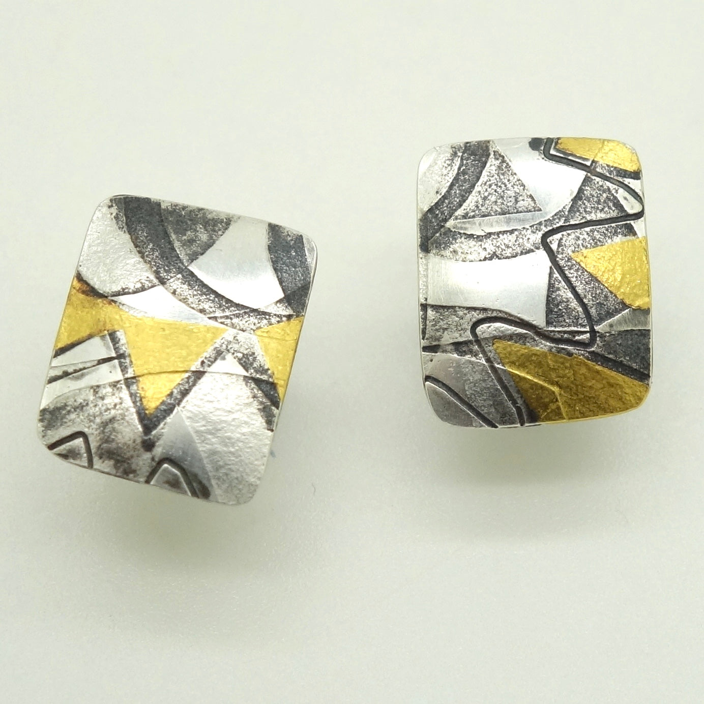 Briggs, Jessica – Gold and Oxidised Silver Studs