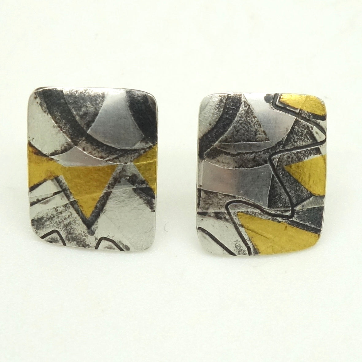 Briggs, Jessica – Gold and Oxidised Silver Studs