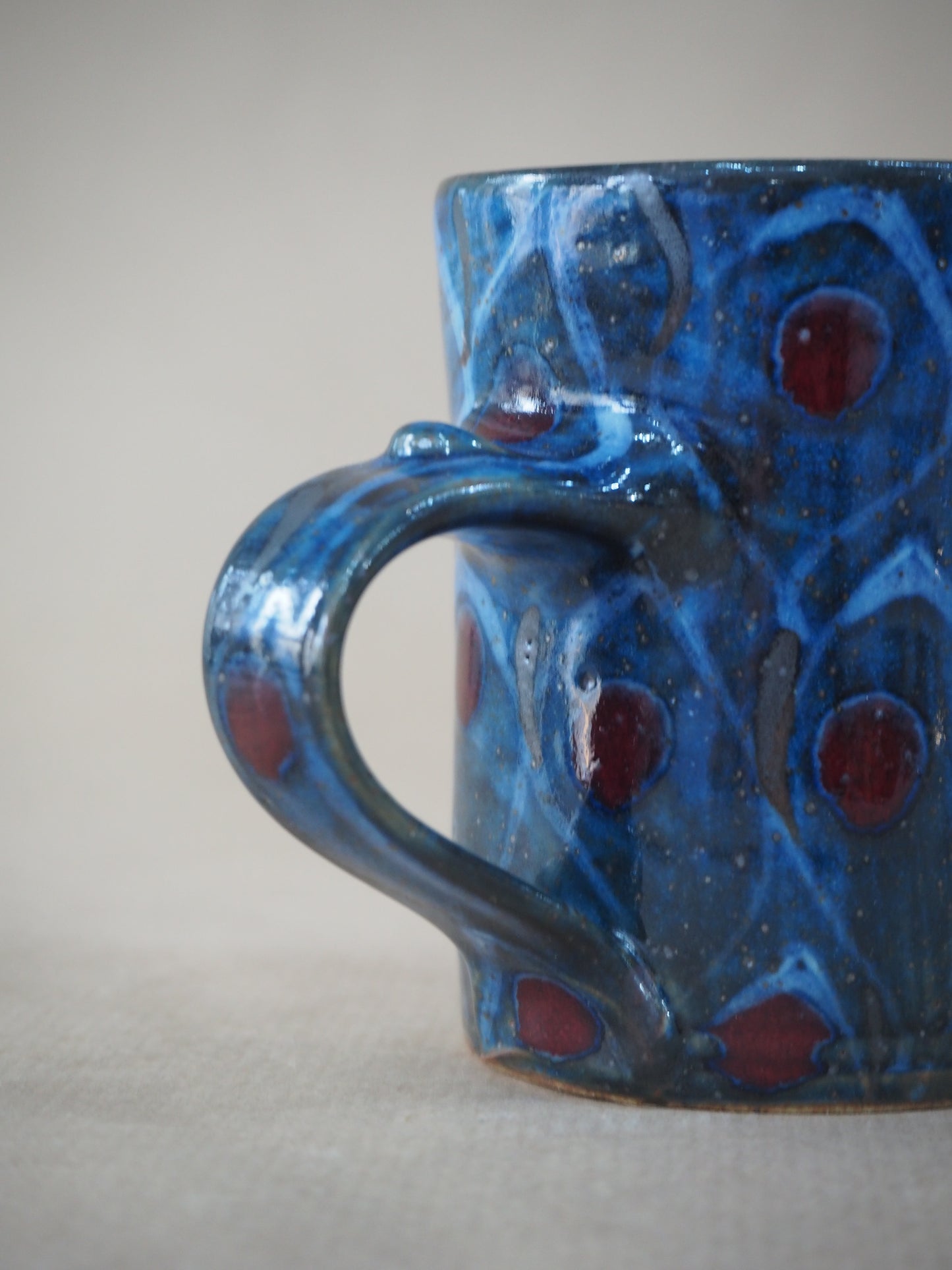 Goldsmith, Robert – Small Red, Blue & Silver Peacock Mug