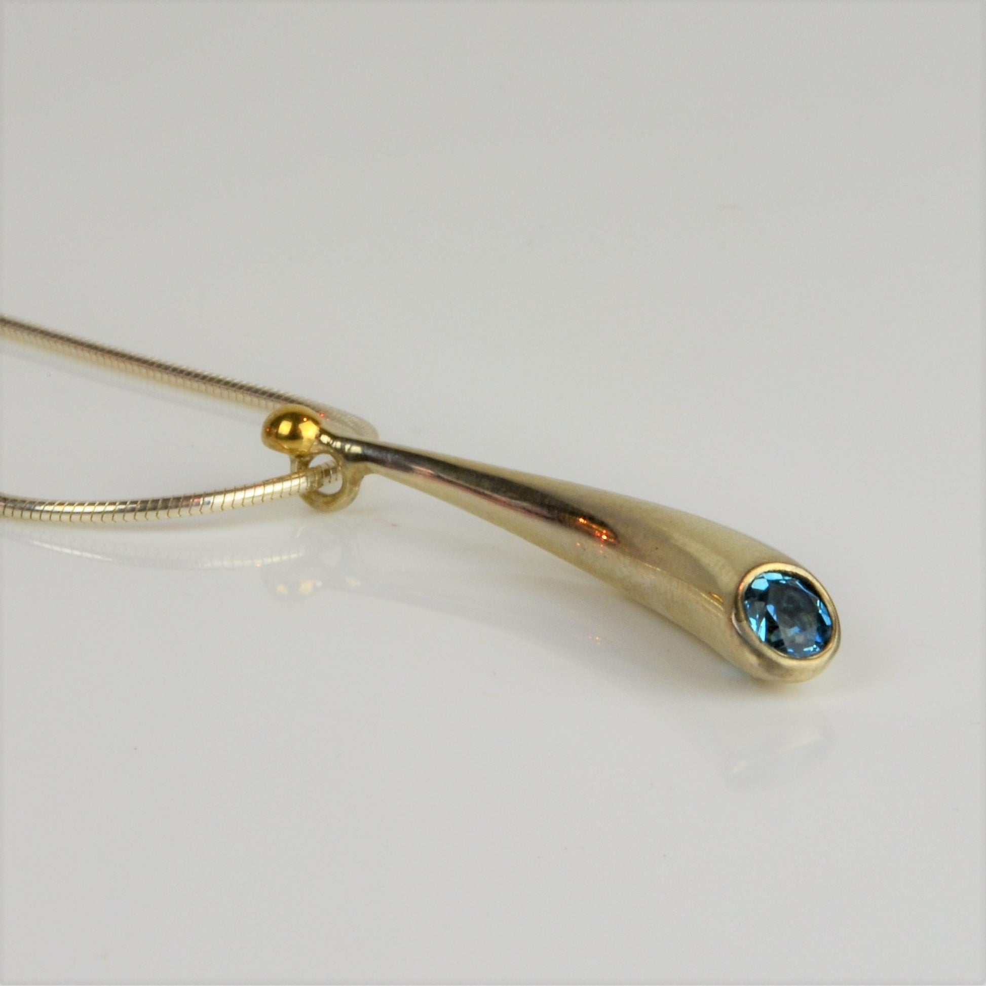 Finch, Paul – Silver and Topaz Pendant with Gold Detail | Paul Finch | Primavera Gallery